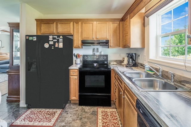 2003 Riverview Ln, Morehead City, NC 28557 - kitchen featuring black appliances, a sink, exhaust hood, and brown cabinets