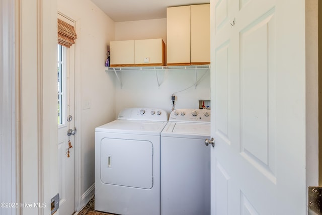 2003 Riverview Ln, Morehead City, NC 28557 - laundry area featuring washer and dryer and cabinet space