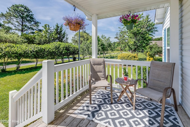 2003 Riverview Ln, Morehead City, NC 28557 - wooden porch with a lawn