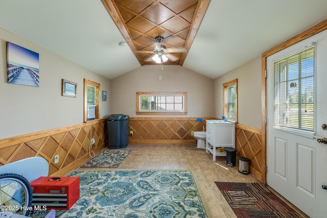 2003 Riverview Ln, Morehead City, NC 28557 - sitting room with a ceiling fan, a wainscoted wall, and lofted ceiling