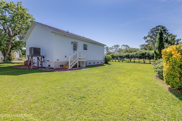 2003 Riverview Ln, Morehead City, NC 28557 - back of house with a lawn, cooling unit, and crawl space