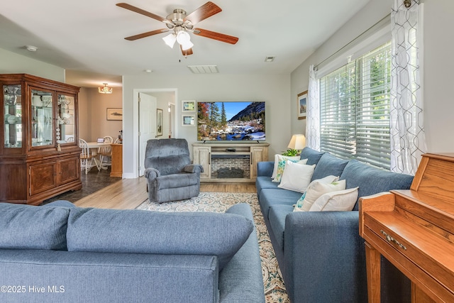 2003 Riverview Ln, Morehead City, NC 28557 - living room featuring wood finished floors and a ceiling fan