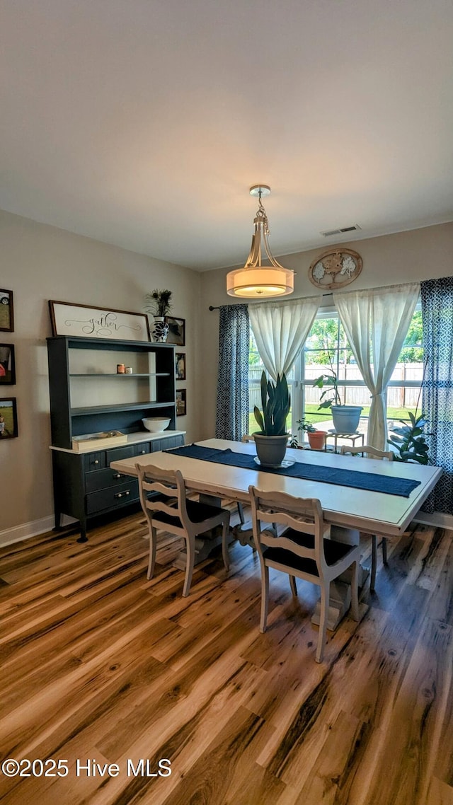 435 Lancaster Dr, Vass, NC 28394 - dining area featuring plenty of natural light and wood finished floors