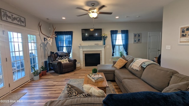 435 Lancaster Dr, Vass, NC 28394 - living area featuring plenty of natural light, a ceiling fan, light wood-type flooring, recessed lighting, and a fireplace