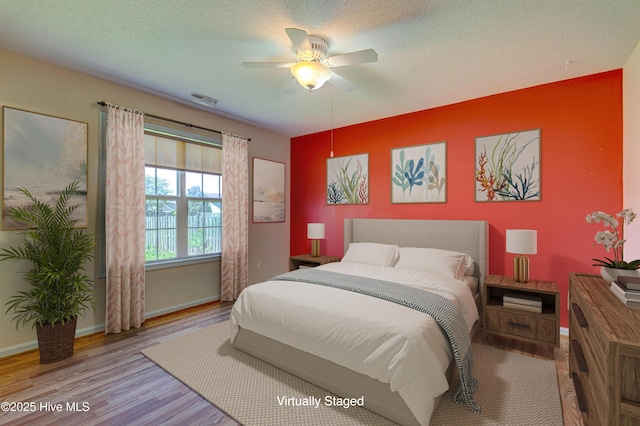 435 Foxfield Ct, Wilmington, NC 28411 - bedroom with wood finished floors, baseboards, and a ceiling fan
