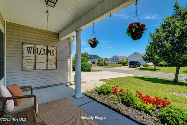 435 Foxfield Ct, Wilmington, NC 28411 - covered porch with a yard and a residential view