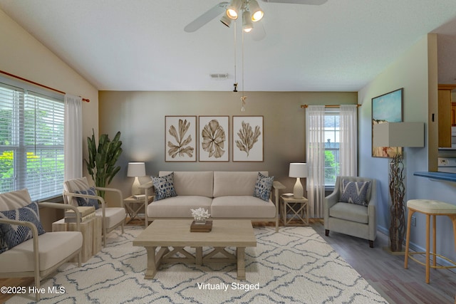 435 Foxfield Ct, Wilmington, NC 28411 - living area featuring ceiling fan, wood finished floors, and vaulted ceiling