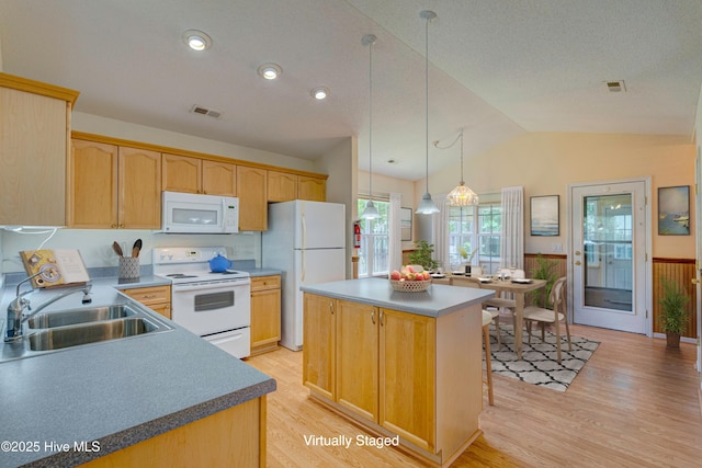 435 Foxfield Ct, Wilmington, NC 28411 - kitchen with white appliances, a sink, light wood finished floors, a kitchen island, and lofted ceiling