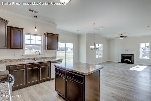 129 Tides End Dr Lot 34, Holly Ridge, NC 28445 - kitchen with a sink, a ceiling fan, appliances with stainless steel finishes, dark brown cabinetry, and a chandelier