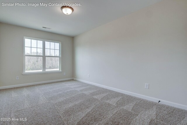 129 Tides End Dr Lot 34, Holly Ridge, NC 28445 - empty room with carpet and baseboards