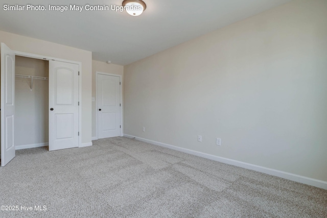 129 Tides End Dr Lot 34, Holly Ridge, NC 28445 - unfurnished bedroom featuring carpet flooring, baseboards, and a closet