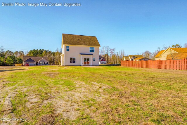 129 Tides End Dr Lot 34, Holly Ridge, NC 28445 - back of house featuring stucco siding