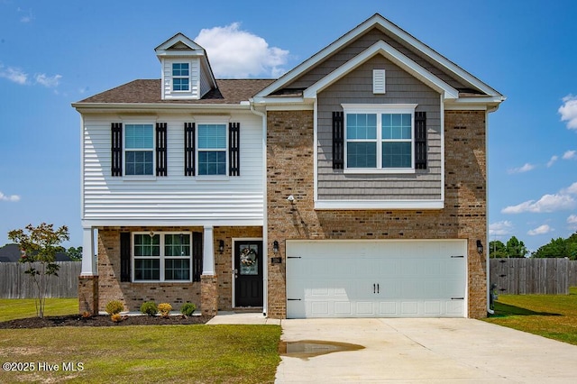106 Featherstone Ln, New Bern, NC 28562 - view of front facade featuring brick siding, an attached garage, and concrete driveway