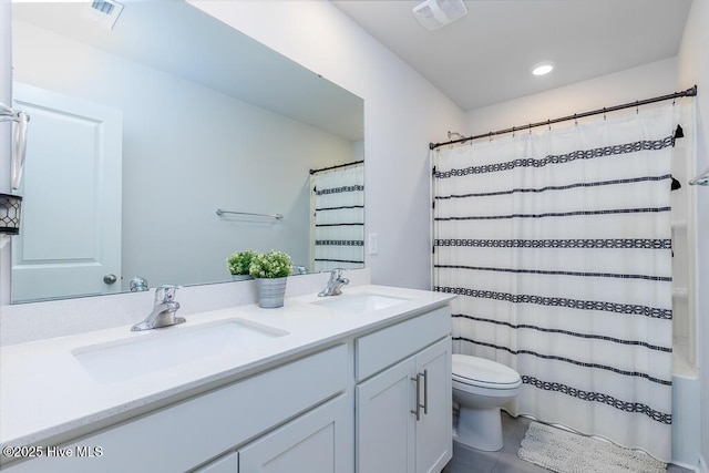106 Featherstone Ln, New Bern, NC 28562 - bathroom featuring double vanity, toilet, recessed lighting, and a shower with curtain