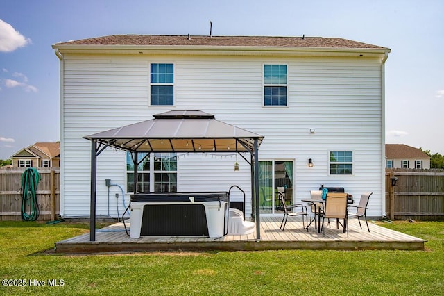 106 Featherstone Ln, New Bern, NC 28562 - back of property with a gazebo, a hot tub, and a deck