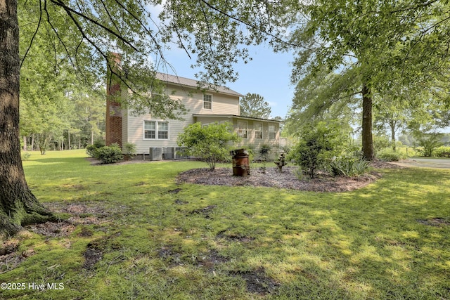 353 Old Savannah Rd, Burgaw, NC 28425 - view of green lawn with central AC