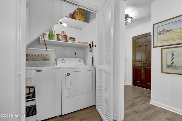 353 Old Savannah Rd, Burgaw, NC 28425 - laundry room with independent washer and dryer, light wood-style flooring, and baseboards