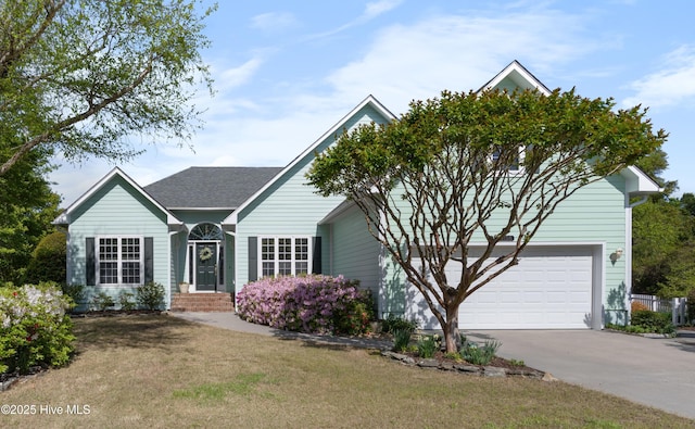 4156 Buckingham Ct, Southport, NC 28461 - ranch-style home featuring driveway, an attached garage, and a front yard