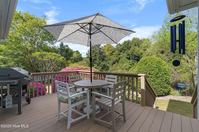 4156 Buckingham Ct, Southport, NC 28461 - wooden terrace featuring outdoor dining area and area for grilling