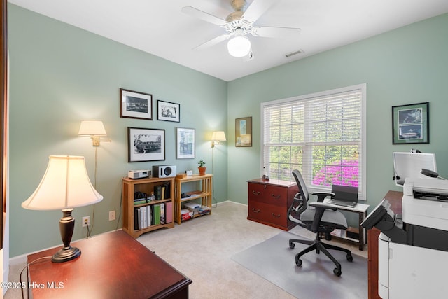 4156 Buckingham Ct, Southport, NC 28461 - office area featuring light colored carpet, a ceiling fan, and baseboards