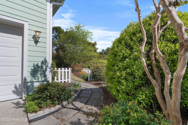 4156 Buckingham Ct, Southport, NC 28461 - view of yard featuring a garage