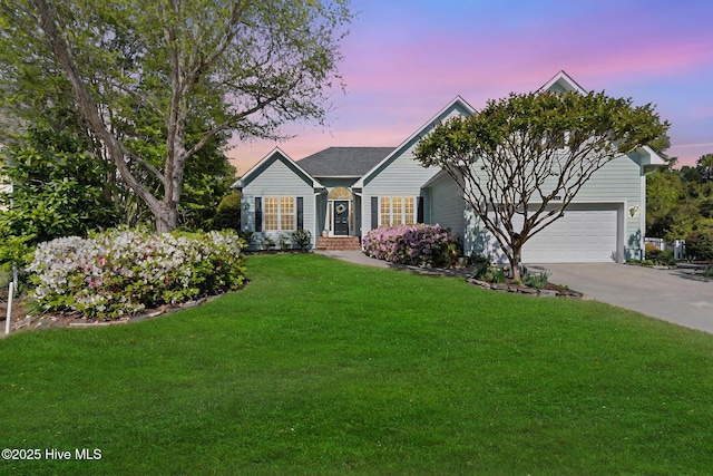 4156 Buckingham Ct, Southport, NC 28461 - ranch-style home featuring concrete driveway, a lawn, and an attached garage