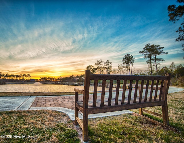 4156 Buckingham Ct, Southport, NC 28461 - deck at dusk with a water view