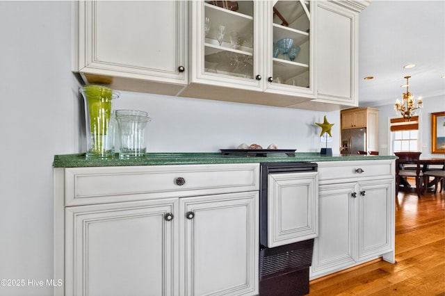 1510 N Shore Dr, Sunset Beach, NC 28468 - bar with light wood-type flooring, a chandelier, hanging light fixtures, recessed lighting, and stainless steel fridge with ice dispenser