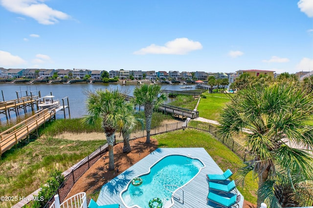 1510 N Shore Dr, Sunset Beach, NC 28468 - view of pool featuring a fenced backyard, a water view, a boat dock, and a residential view