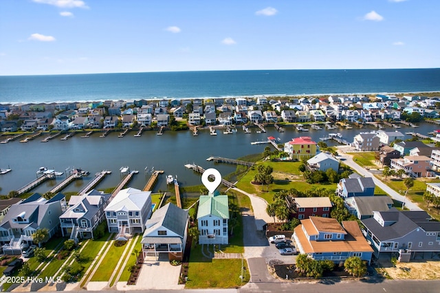 1510 N Shore Dr, Sunset Beach, NC 28468 - aerial view of residential area with a nearby body of water