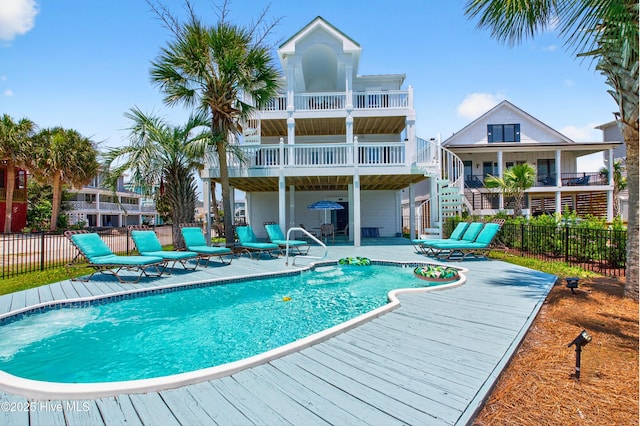 1510 N Shore Dr, Sunset Beach, NC 28468 - view of pool with stairway, a patio area, and a deck