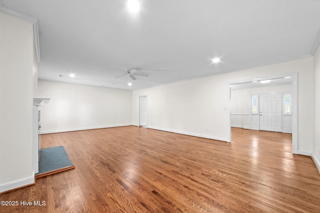 809 Greenbriar Rd, Kinston, NC 28501 - unfurnished living room with a ceiling fan, wood finished floors, baseboards, and recessed lighting
