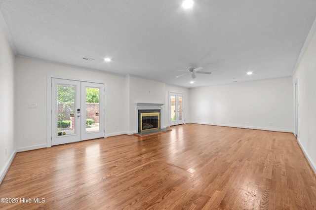 809 Greenbriar Rd, Kinston, NC 28501 - unfurnished living room with french doors, ceiling fan, light wood finished floors, recessed lighting, and baseboards