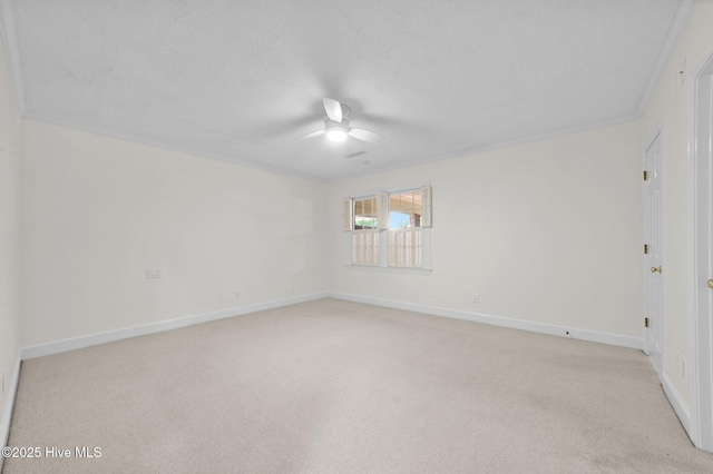 809 Greenbriar Rd, Kinston, NC 28501 - spare room with a ceiling fan, light carpet, baseboards, and a textured ceiling