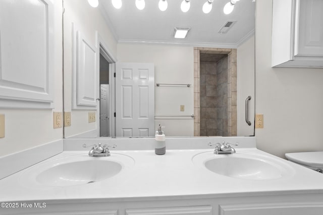 809 Greenbriar Rd, Kinston, NC 28501 - full bathroom with double vanity, ornamental molding, toilet, and tiled shower