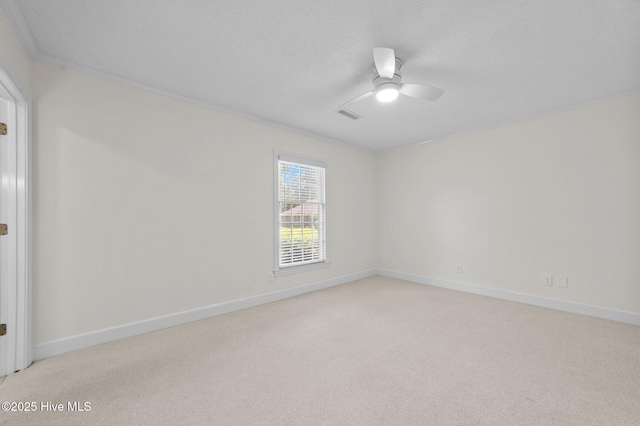 809 Greenbriar Rd, Kinston, NC 28501 - empty room featuring light carpet, a ceiling fan, ornamental molding, and baseboards