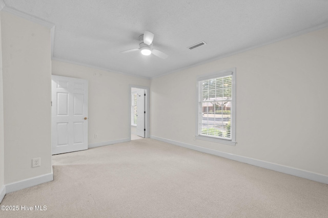 809 Greenbriar Rd, Kinston, NC 28501 - unfurnished bedroom featuring carpet, crown molding, baseboards, a textured ceiling, and ceiling fan