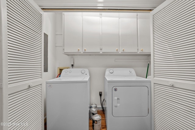 809 Greenbriar Rd, Kinston, NC 28501 - laundry area featuring cabinet space, washer and dryer, and electric panel