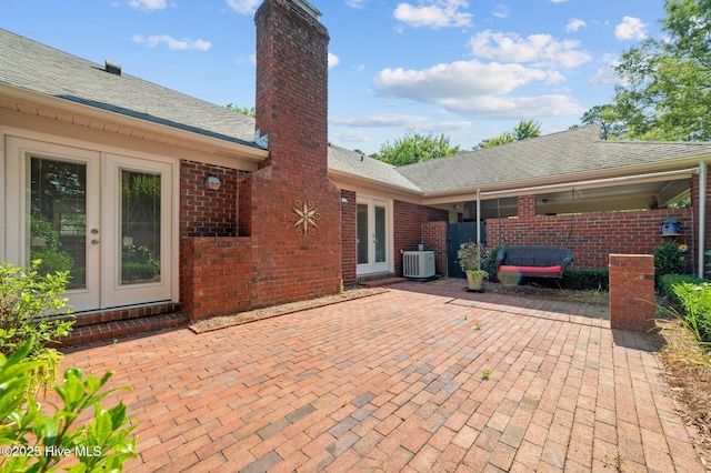 809 Greenbriar Rd, Kinston, NC 28501 - view of patio with french doors and central AC unit
