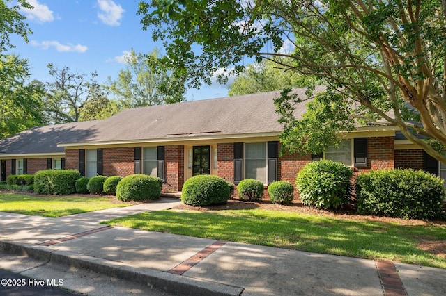 809 Greenbriar Rd, Kinston, NC 28501 - ranch-style house featuring brick siding, a front yard, and roof with shingles