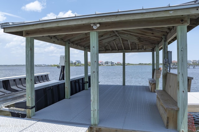 601 New River Inlet Rd, North Topsail Beach, NC 28460 - dock featuring boat lift and a water view