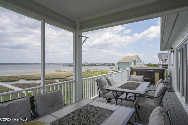 601 New River Inlet Rd, North Topsail Beach, NC 28460 - wooden deck with a water view, a hot tub, and outdoor dining area