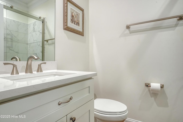 601 New River Inlet Rd, North Topsail Beach, NC 28460 - full bath featuring vanity, toilet, a marble finish shower, and ornamental molding