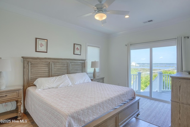 601 New River Inlet Rd, North Topsail Beach, NC 28460 - bedroom with ornamental molding, access to outside, wood finished floors, ceiling fan, and recessed lighting
