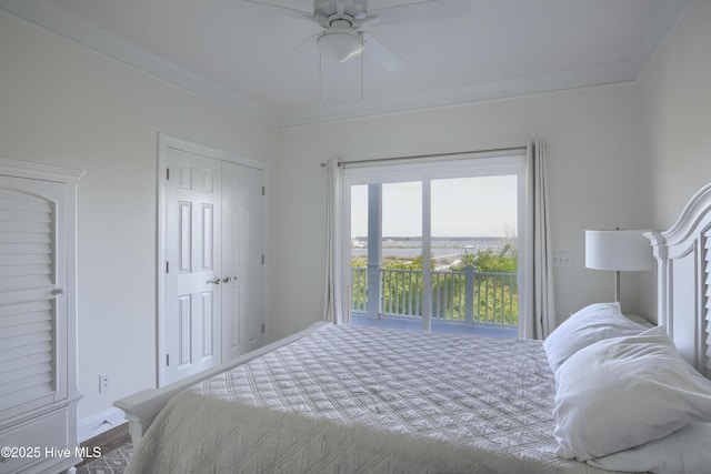 601 New River Inlet Rd, North Topsail Beach, NC 28460 - bedroom with crown molding and a ceiling fan