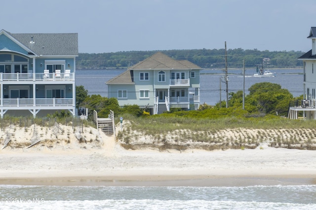 601 New River Inlet Rd, North Topsail Beach, NC 28460 - rear view of property featuring view of water and beach and a balcony