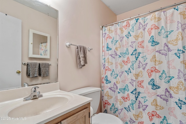 102 Oakwood Ln, Elizabeth City, NC 27909 - full bathroom with toilet, vanity, and a shower with curtain