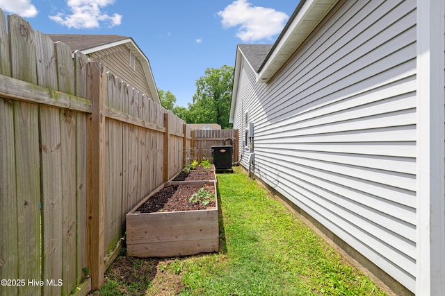 102 Oakwood Ln, Elizabeth City, NC 27909 - view of yard with a vegetable garden and cooling unit