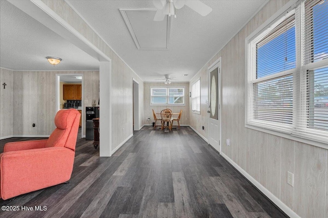 3331 Holden Beach Rd SW, Supply, NC 28462 - hallway featuring wood finished floors, attic access, a textured ceiling, and baseboards