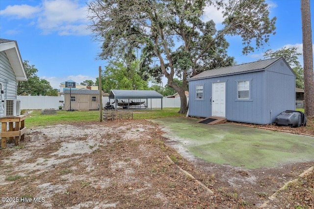 3331 Holden Beach Rd SW, Supply, NC 28462 - view of yard with a carport, central AC unit, and an outdoor structure